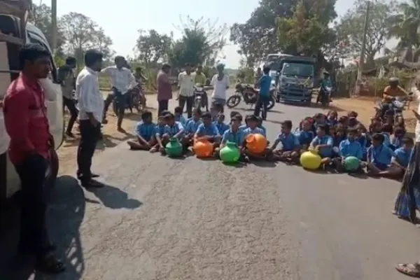 Students protest by blocking the road for drinking water